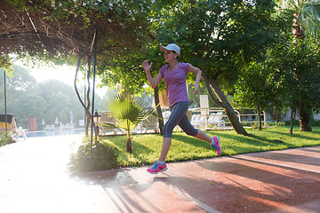 Image showing sporty woman jogging