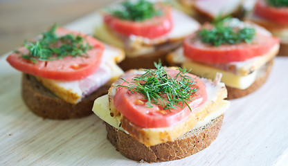 Image showing sandwiches on a board