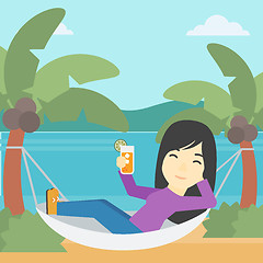 Image showing Woman chilling in hammock.