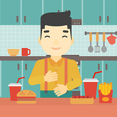 Image showing Satisfied man eating fast food.