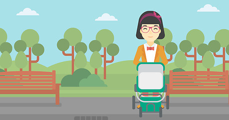 Image showing Mother walking with baby stroller.