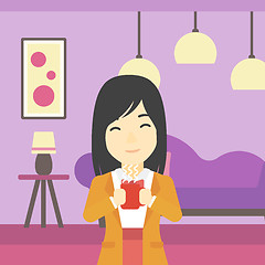 Image showing Woman enjoying cup of hot coffee.