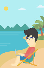 Image showing Businessman working on laptop on the beach.