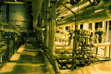 Image showing Pipes, tubes, machinery and steam turbine at a power plant