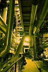 Image showing Pipes, tubes, machinery and steam turbine at a power plant