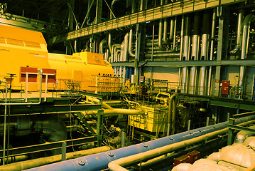 Image showing Pipes, machinery, tubes and turbine at a power plant