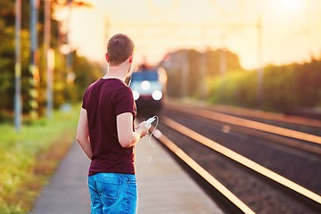 Image showing Railway station at the sunset