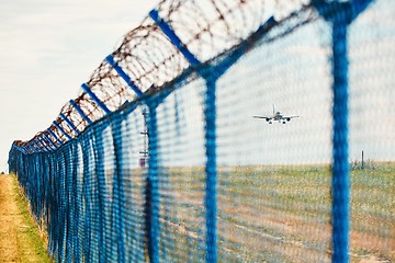 Image showing Barbed wire around airport