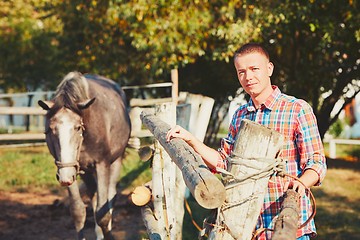 Image showing Man with horse