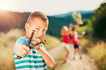 Image showing Boy with slingshot