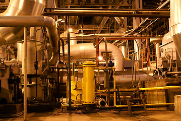 Image showing Pipes and tubes and chimney at a power plant