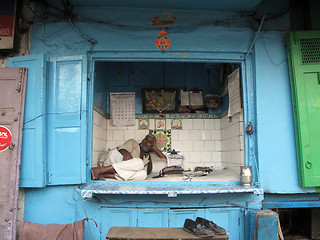 Image showing Streets of Kolkata. notary sitting in his office and waits for a customer