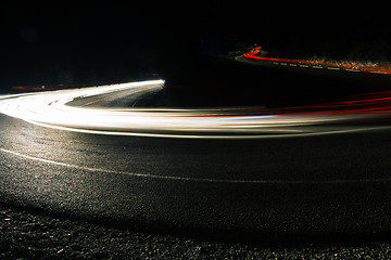 Image showing Bright car lines on night road