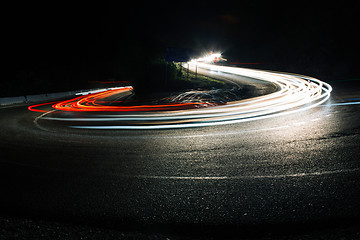 Image showing Bright car lines on night road