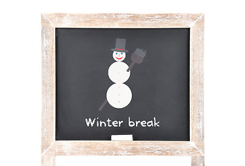 Image showing Christmas break with snowman on blackboard