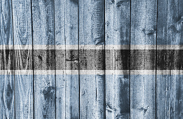 Image showing Flag on weathered wood