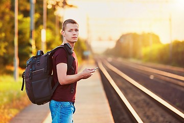 Image showing Traveler at the sunset