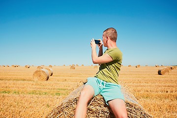 Image showing Young man on the cornfield