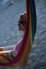 Image showing relaxed woman laying in hammock