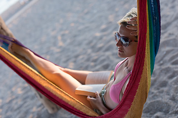 Image showing relaxed woman laying in hammock