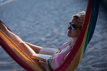 Image showing relaxed woman laying in hammock