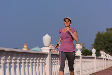 Image showing sporty woman jogging