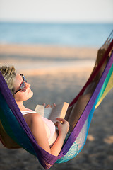 Image showing relaxed woman laying in hammock