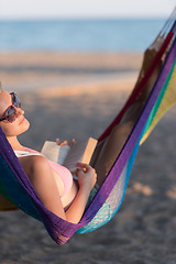 Image showing relaxed woman laying in hammock