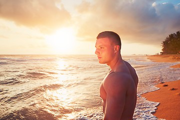 Image showing Athletic man on the tropical beach