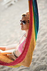 Image showing relaxed woman laying in hammock