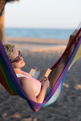 Image showing relaxed woman laying in hammock