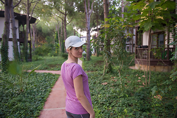 Image showing woman  stretching before morning jogging