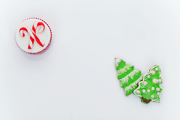 Image showing New Year cupcake and cookies