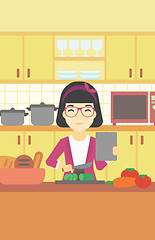 Image showing Woman cooking healthy vegetable salad.