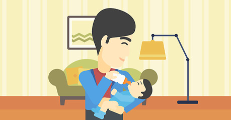 Image showing Father feeding baby.