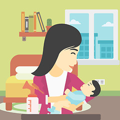 Image showing Mother with baby and breast pump.