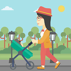 Image showing Mother walking with her baby in stroller.