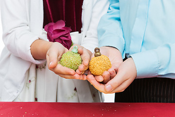 Image showing Children holding christmas dessert