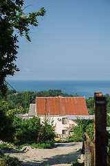 Image showing Rural house in countryside against of sea