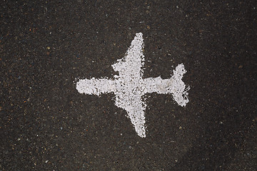 Image showing White painted airplane on asphalt