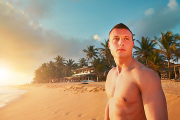 Image showing Athletic man on the tropical beach