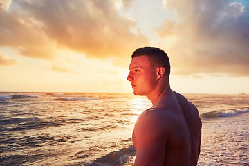 Image showing Athletic man on the tropical beach