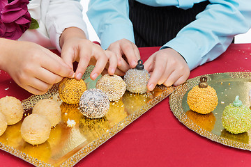 Image showing Children making christmas dessert