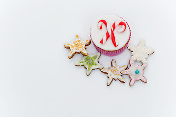 Image showing New Year cupcake and cookies