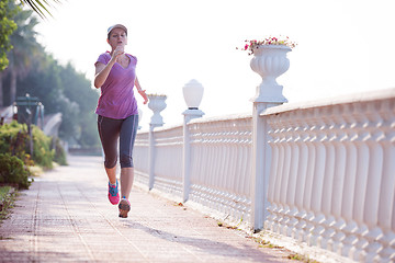 Image showing sporty woman jogging