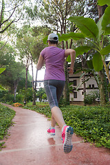 Image showing sporty woman jogging