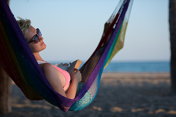 Image showing relaxed woman laying in hammock