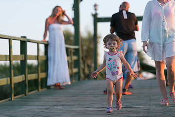 Image showing girl and mother walking