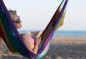 Image showing relaxed woman laying in hammock