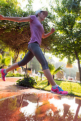 Image showing sporty woman jogging